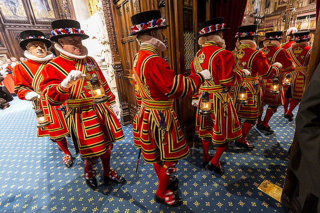 The Yeomen of the Guard proceed to the Lords chamber on their way to undertake the first ceremony of State Opening, the checking of the cellars.