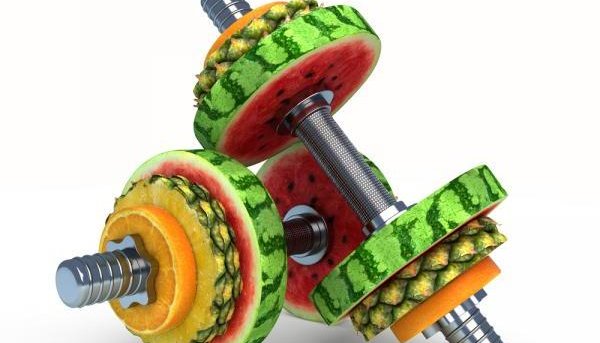 Dumbbells with fruits as weights