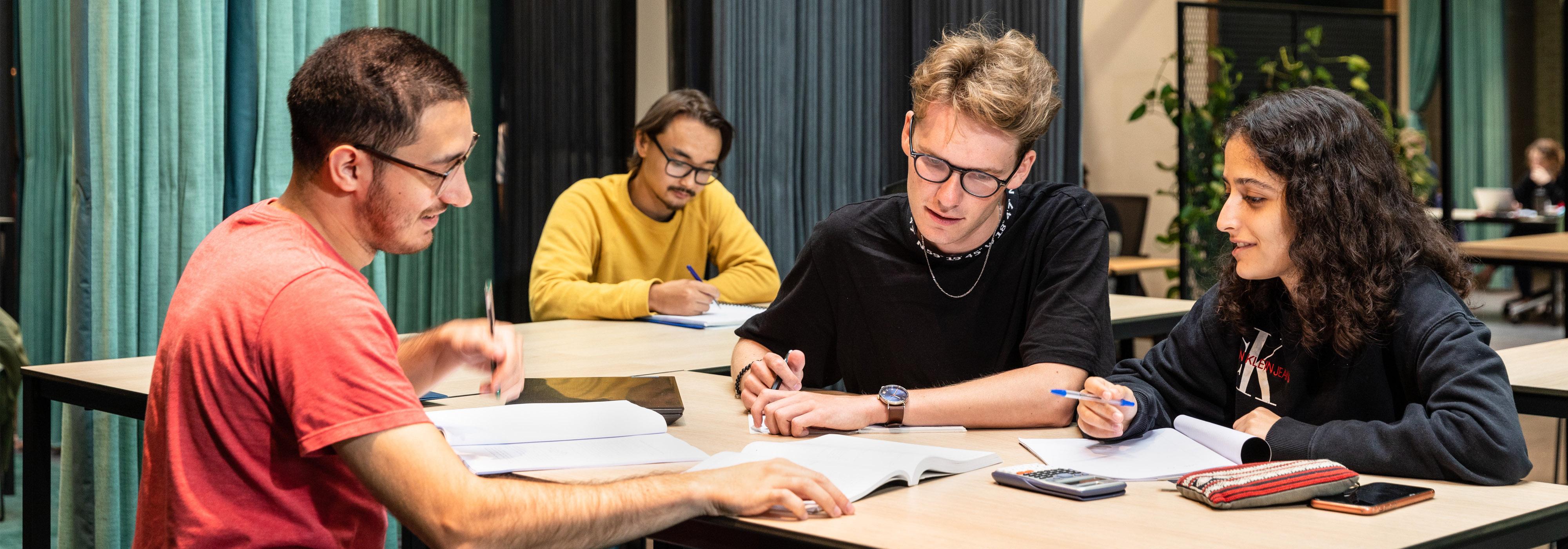 Tutor and students in a common room